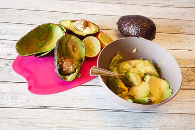 High angle view of fruits in bowl on table