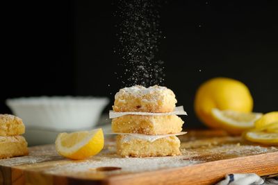 Close-up of food on table against black background