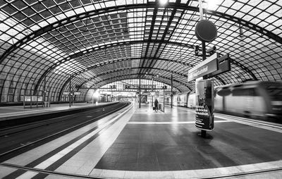 People walking on escalator