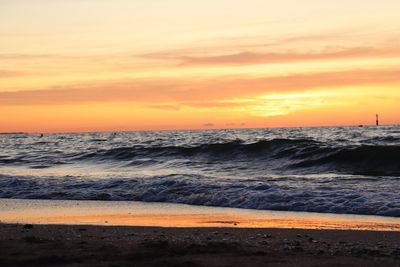 Scenic view of sea against sky during sunset