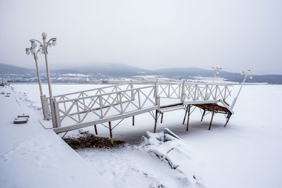 Scenic view of snow covered mountain against sky