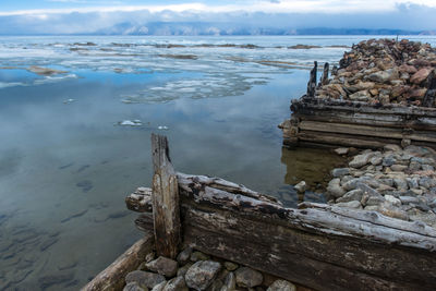 Scenic view of sea against cloudy sky