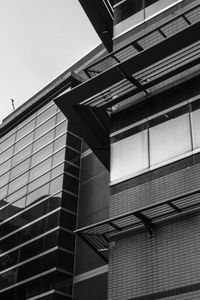 Low angle view of modern building against clear sky
