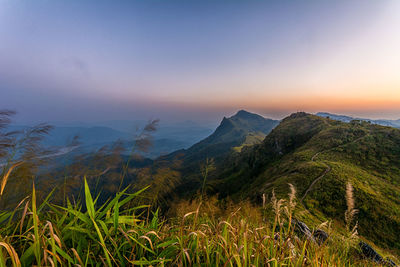 Scenic view of mountains against sky during sunset