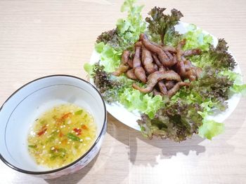 High angle view of salad in bowl on table