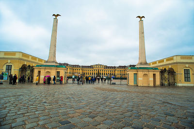 Group of people in front of historical building