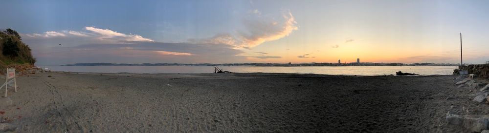 Panoramic view of sea against sky during sunset