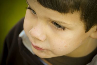 Cute boy looking away outdoors