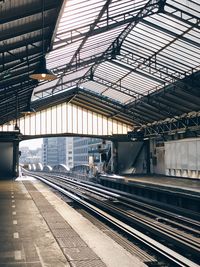 Blurred motion of railroad station with no people and perspective, metallic architecture 