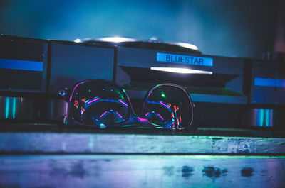 Close-up of sunglasses on table