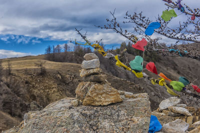 Rock formation on land against sky