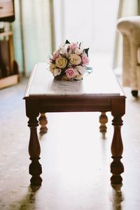 Close-up of rose on table