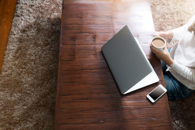 High angle view of mobile phone on table