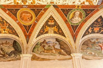 Low angle view of ornate ceiling