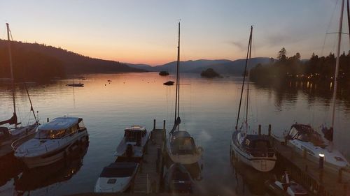 Boats moored at lake windermere 