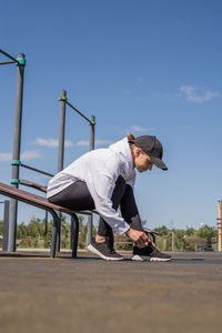 Healthy and active lifestyle. sports and fitness. young sportive woman working out on sport ground