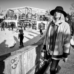 Full length of woman standing against sky