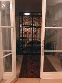 Reflection of building on glass door