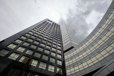 Low angle view of modern building against sky