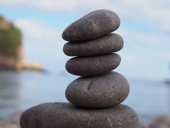 Close-up of stone stack on rock