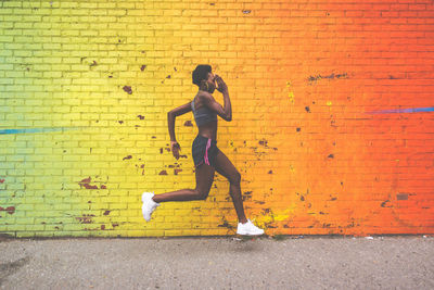 Woman exercising in city