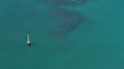 High angle view of buoy at sea