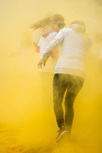 Rear view of people during holi