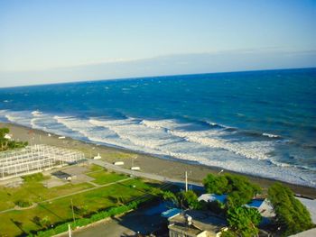 Scenic view of sea against blue sky