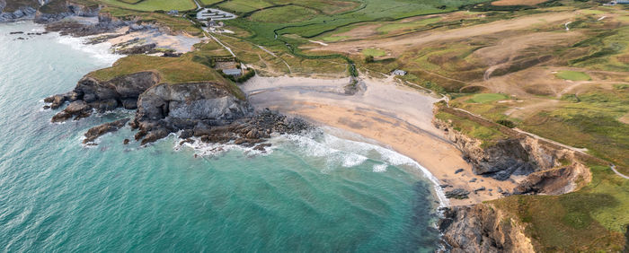 High angle view of rocks on sea