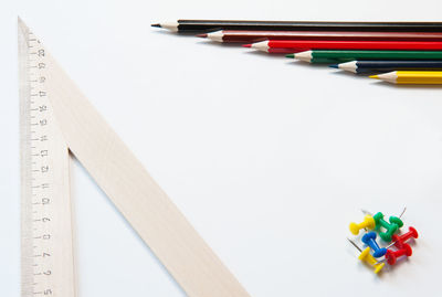 High angle view of colored pencils on table