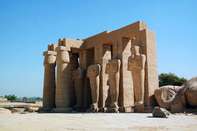 Exterior of temple against clear sky