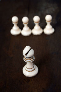 Close-up of chess piece on table