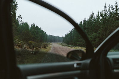 Road seen through car windshield