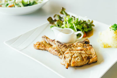 Close-up of grilled meat served in plate