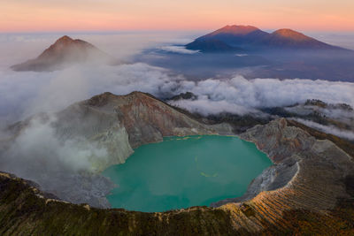 View of volcanic mountain at sunset