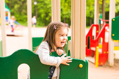 Smiling girl looking away outdoors