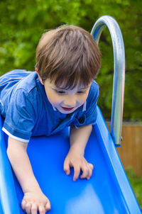 Boy playing in playground