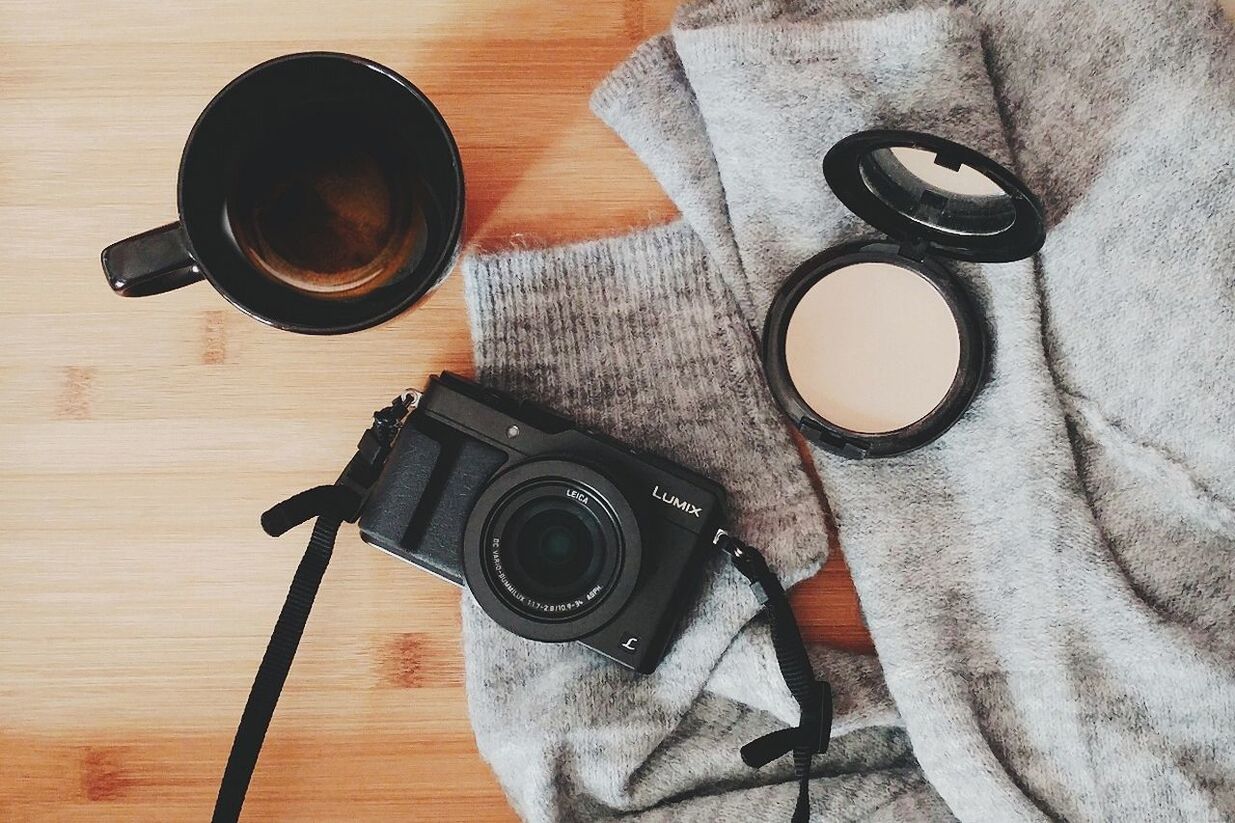 table, directly above, no people, indoors, camera - photographic equipment, old-fashioned, technology, close-up, drink, day