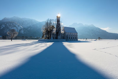 Scenic view of snow covered mountain against clear sky