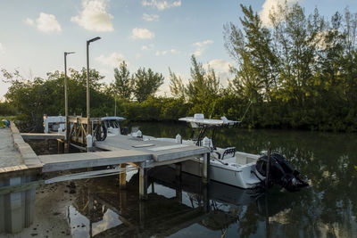 A small boat moored in a quiet corner of south bimini, bahamas