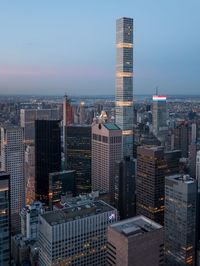 Illuminated skyscrapers in city