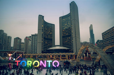 People looking at city skyline