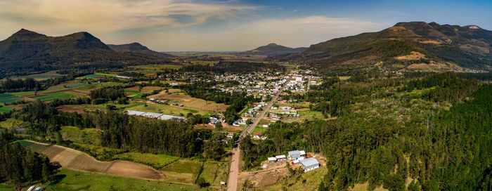 Panoramic view of landscape and buildings against sky