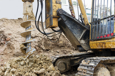 Hydraulic bore pile rig machine at the construction in the foundations.