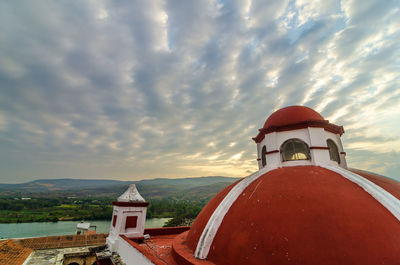 Built structure against cloudy sky