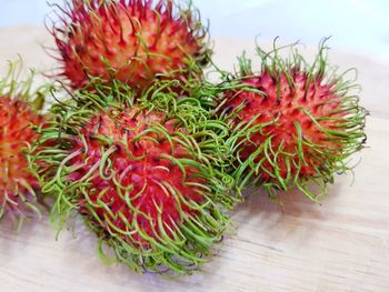 High angle view of strawberries on table