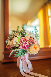 Close-up of flower vase on table