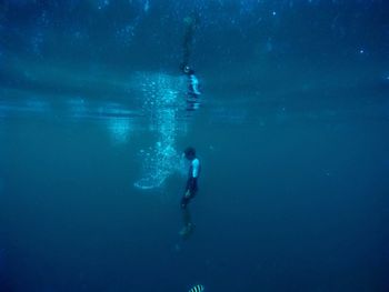 Person swimming in sea