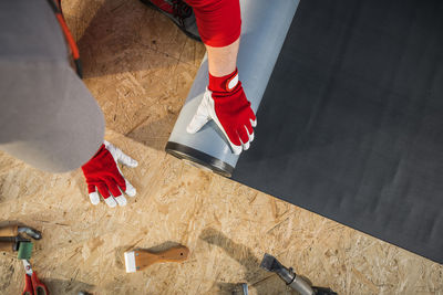 Low section of man standing on floor