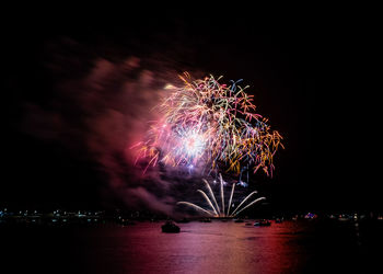 Firework display at night